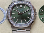 Patek Philippe steel wristwatch with green dial, diamond bezel, and link bracelet