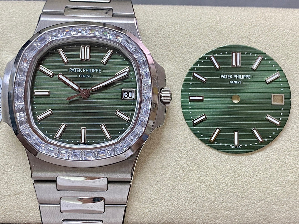 Patek Philippe steel wristwatch with green dial, diamond bezel, and date window