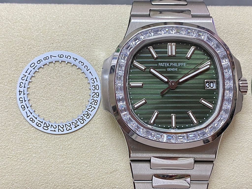 Patek Philippe steel wristwatch with green dial and date window, diamond-set bezel