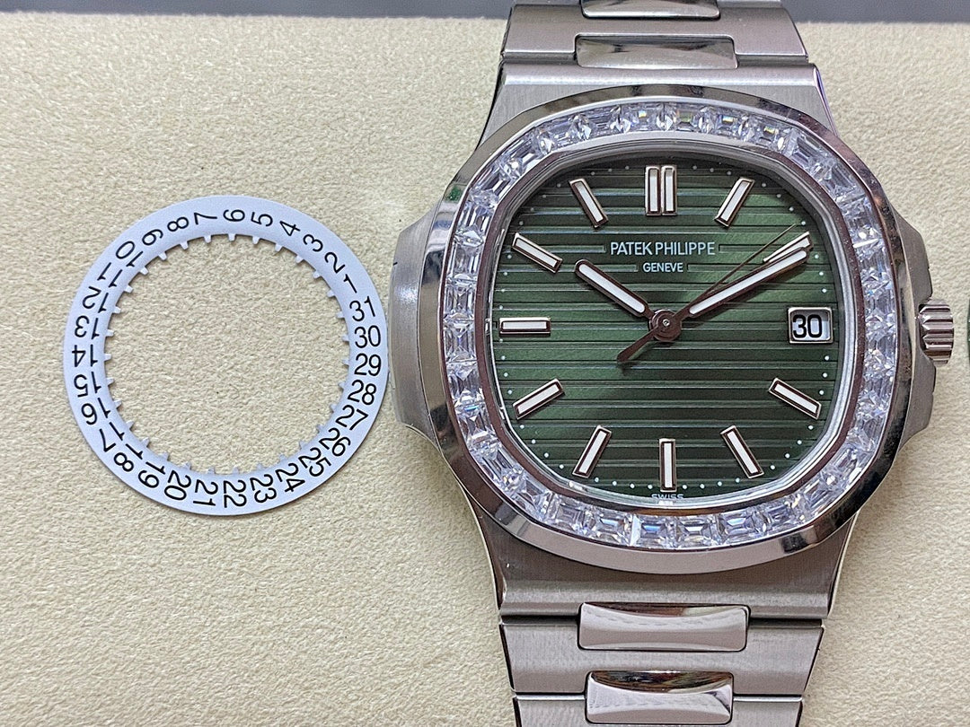 Patek Philippe steel wristwatch with green dial and date window, diamond-set bezel
