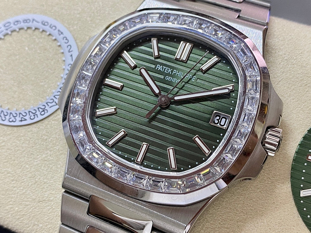 Patek Philippe steel wristwatch with green dial, silver indices, and diamond bezel