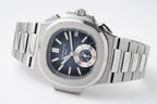 Patek Philippe wristwatch angled view with dark blue dial, steel bracelet, and subdials