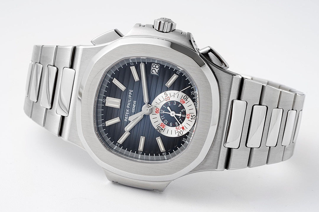 Patek Philippe wristwatch angled view with dark blue dial, steel bracelet, and subdials