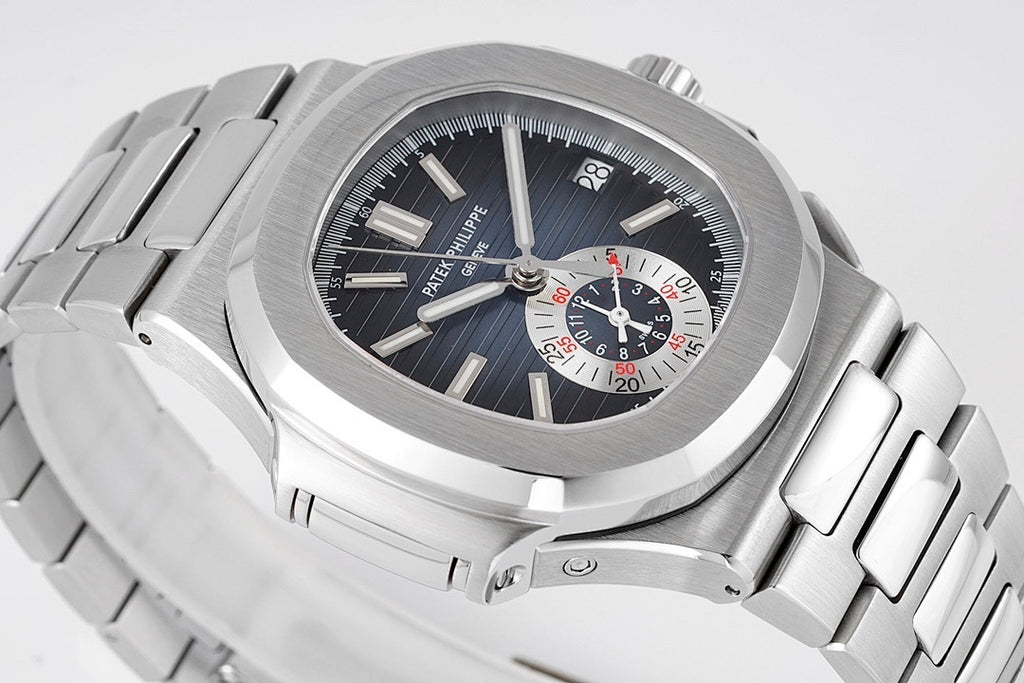 Patek Philippe wristwatch close angled view of dark dial with chronograph subdials