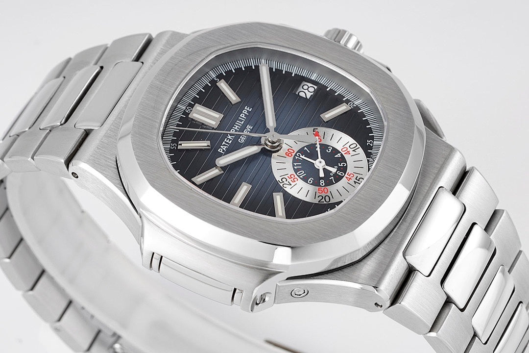 Patek Philippe wristwatch close angled view of dark dial with chronograph subdials