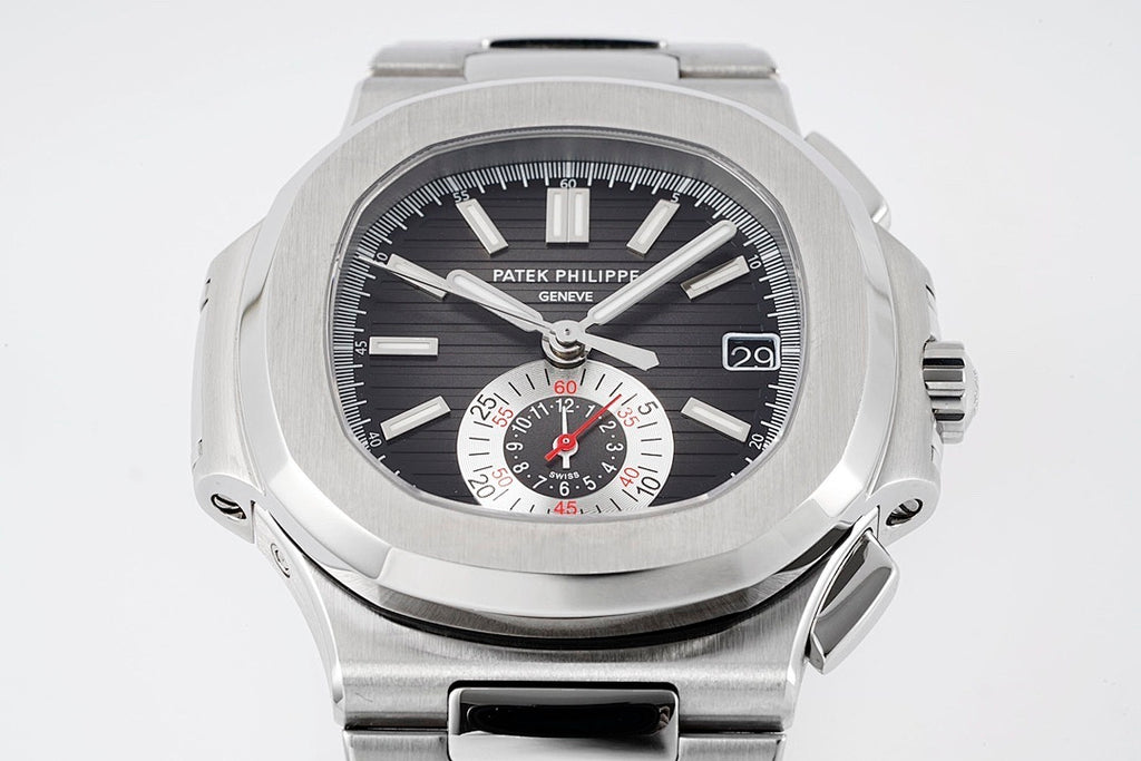 Patek Philippe stainless steel wristwatch close front view with black dial and bezel numerals.