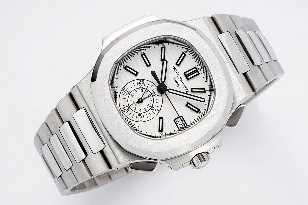 Stainless steel wristwatch top view with white dial, black hands, and three subdials.