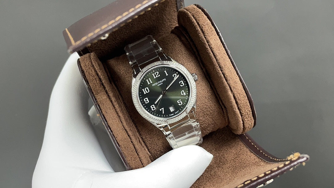 Patek Philippe wristwatch with black dial, silver case, and brown leather strap