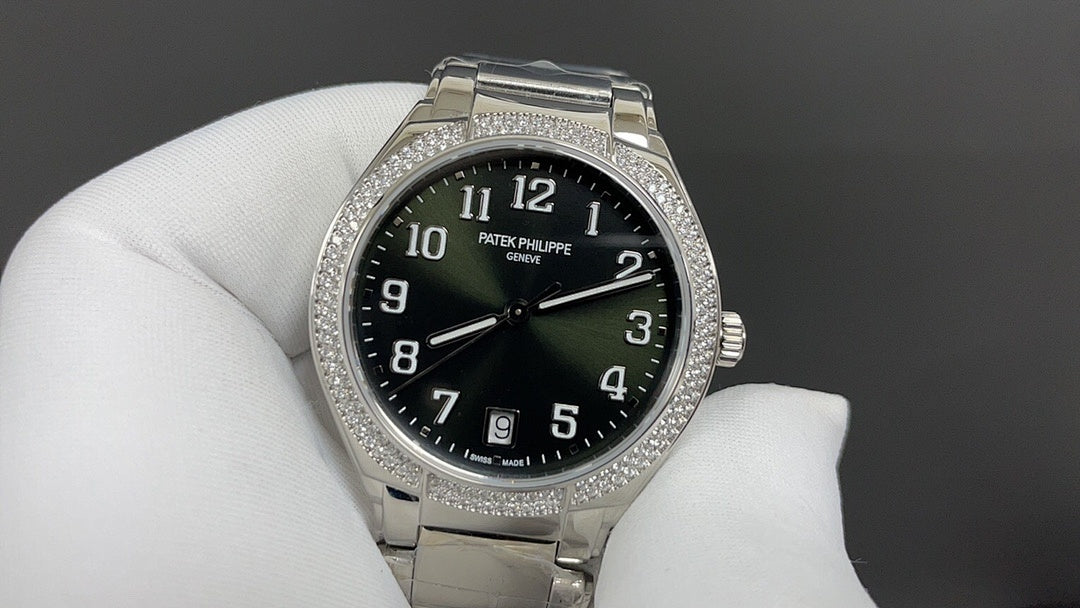 Patek Philippe wristwatch with black dial, silver bracelet, and diamond bezel