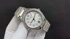 Patek Philippe watch angled view with silver metal bracelet and white dial