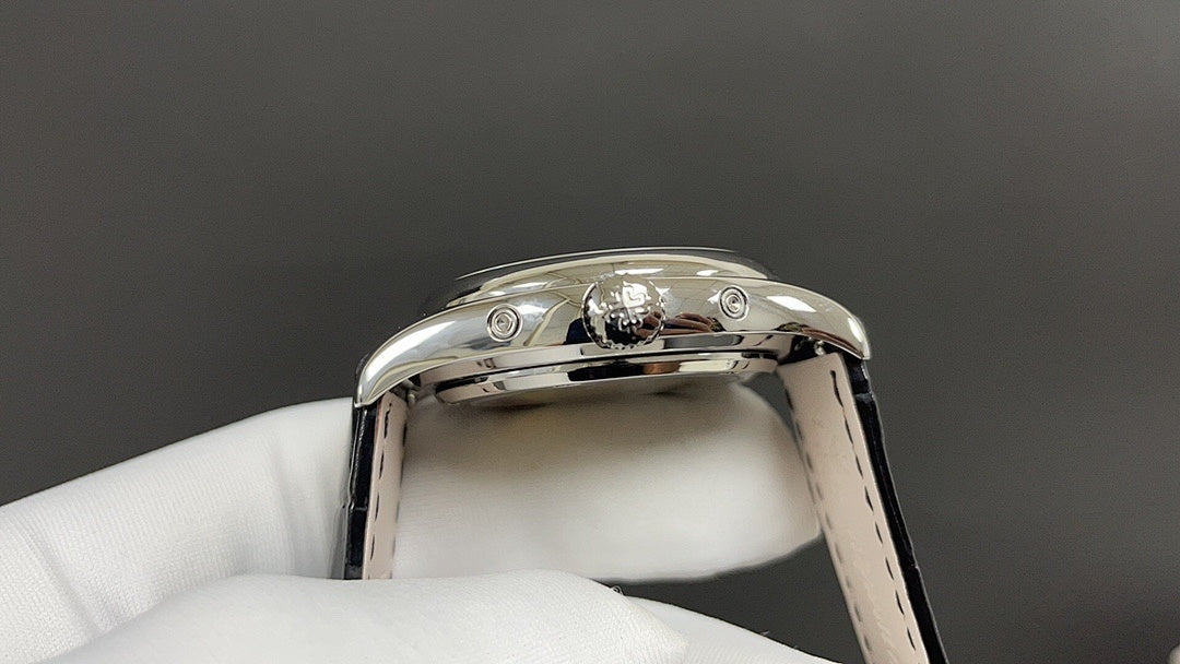 Wristwatch stainless steel bezel with crown and black leather strap