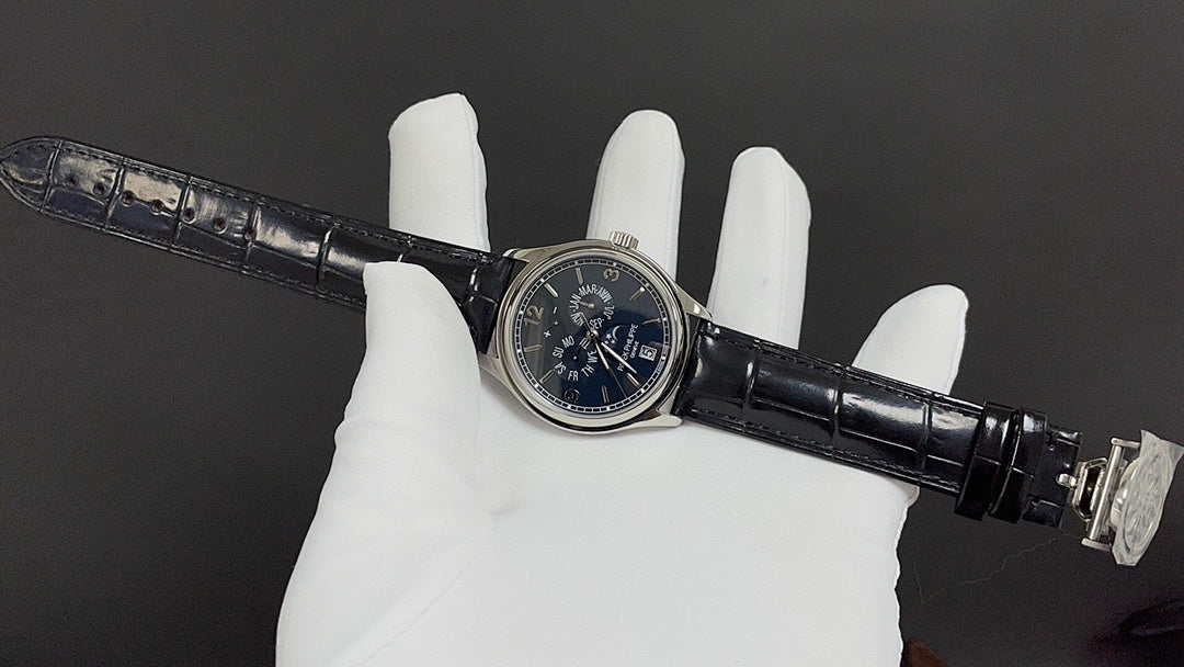 Wristwatch with blue dial on black leather strap