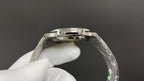 Patek Philippe watch crown and bezel with steel finish, top view