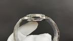 Silver metal wristwatch case back with bracelet links