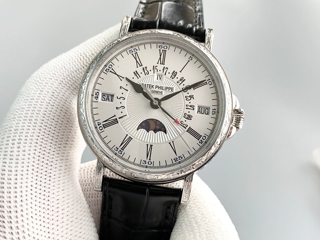 Luxury wristwatch with silver face, Roman numerals, and black leather strap