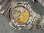 Wristwatch caseback showing movement with gold-toned components and engraved rotor