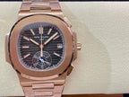 Rose-gold wristwatch with blue dial, baton hands, three subdials and date window
