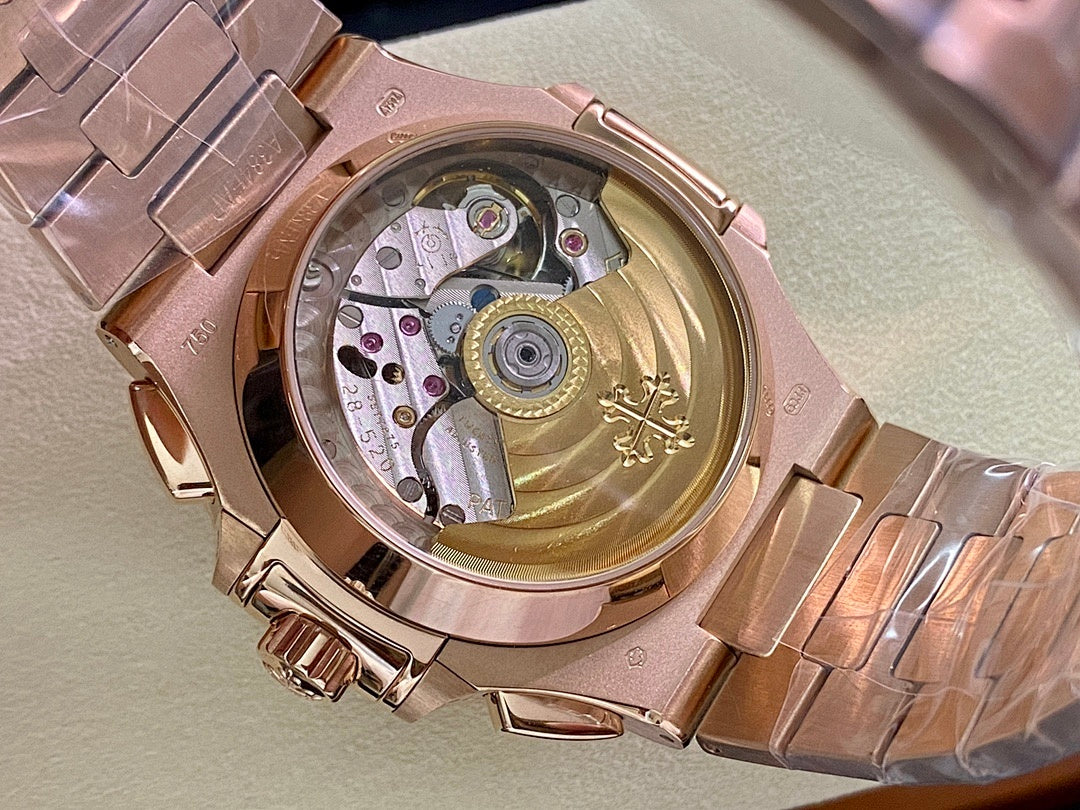 Rose-gold caseback view with gold-toned movement visible through glass