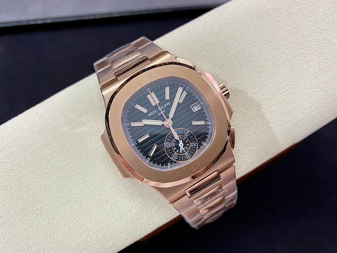 Rose-gold wristwatch angled view with blue dial and date window at 3