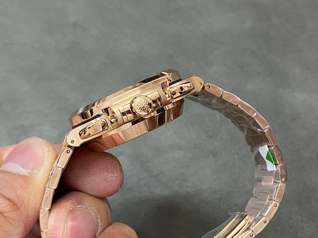 Patek Philippe watch with rose-gold tone case and metal bracelet, clasp area shown