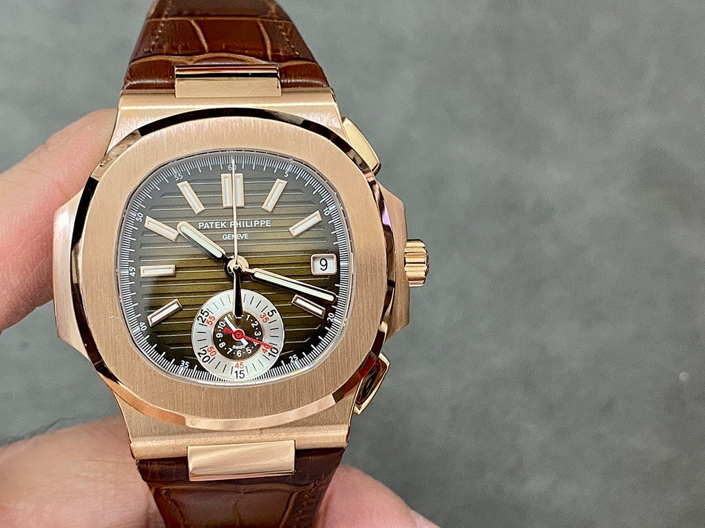 Rose-gold chronograph watch with dark olive dial, date window, brown leather strap