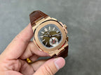 Rose-gold sport watch with olive dial and brown leather strap, angled view