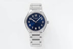 Stainless steel wristwatch with blue dial, diamond bezel, and metal bracelet