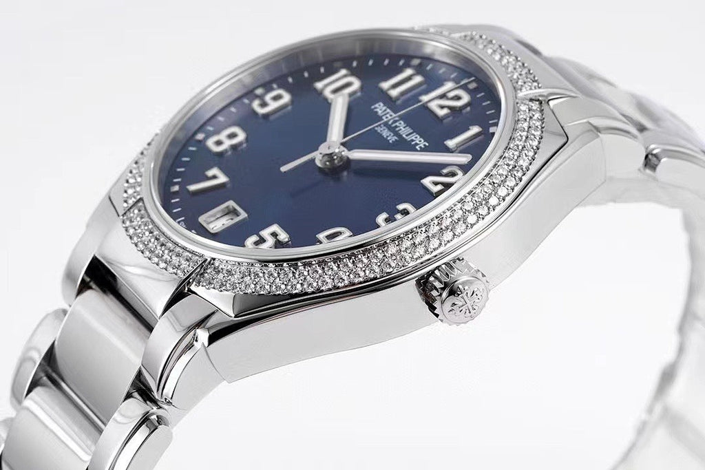 Stainless steel watch with blue dial, diamond bezel, and crown detail