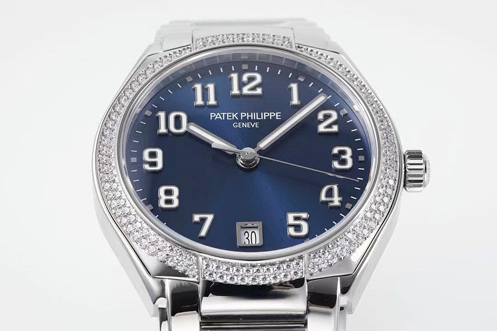 Patek Philippe Geneve wristwatch with blue dial, diamond bezel, steel bracelet