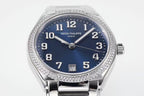 Patek Philippe Geneve wristwatch with blue dial, diamond bezel, steel bracelet