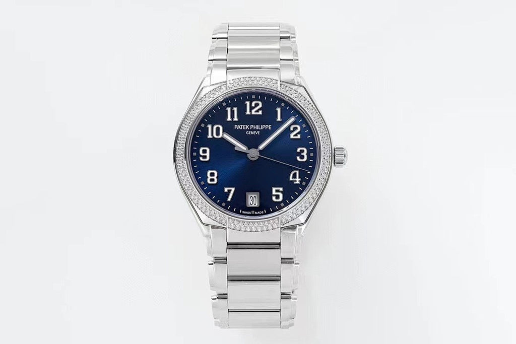 Stainless steel wristwatch with blue dial, diamond bezel, and link bracelet