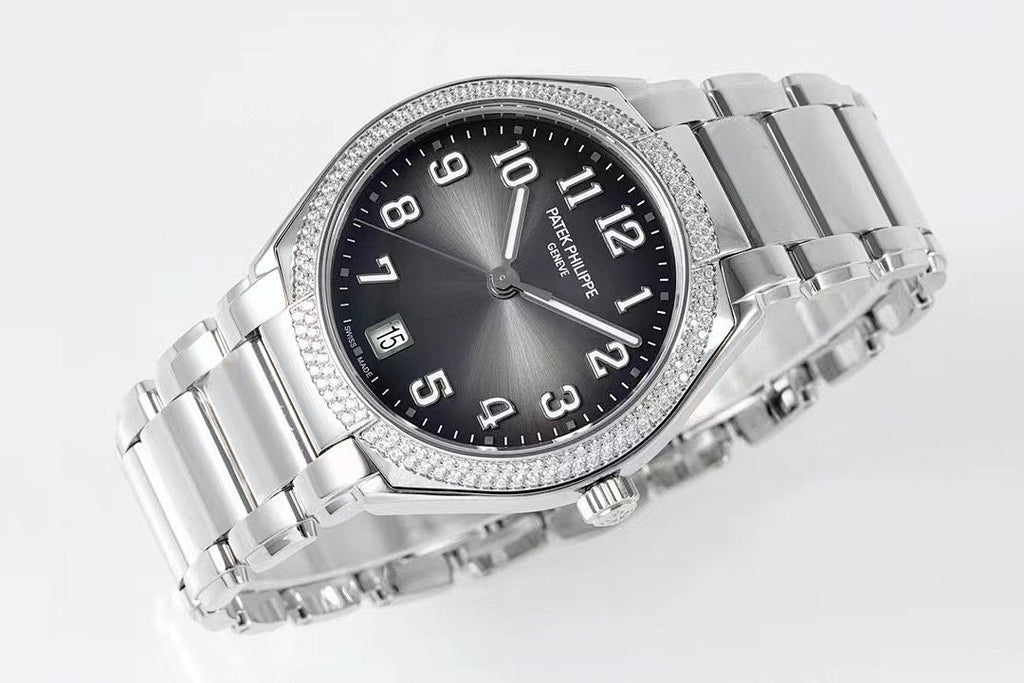 Diamond bezel steel wristwatch angled view with dark dial, Arabic numerals, and metal bracelet