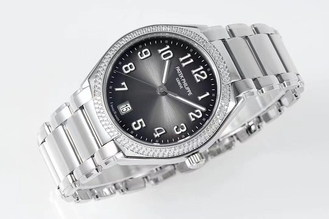 Diamond bezel steel wristwatch angled view with dark dial, Arabic numerals, and metal bracelet