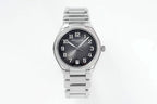 Steel wristwatch with diamond bezel, dark dial, date window, and matching metal bracelet