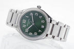 Men's steel wristwatch with green dial, diamond bezel, and metal bracelet
