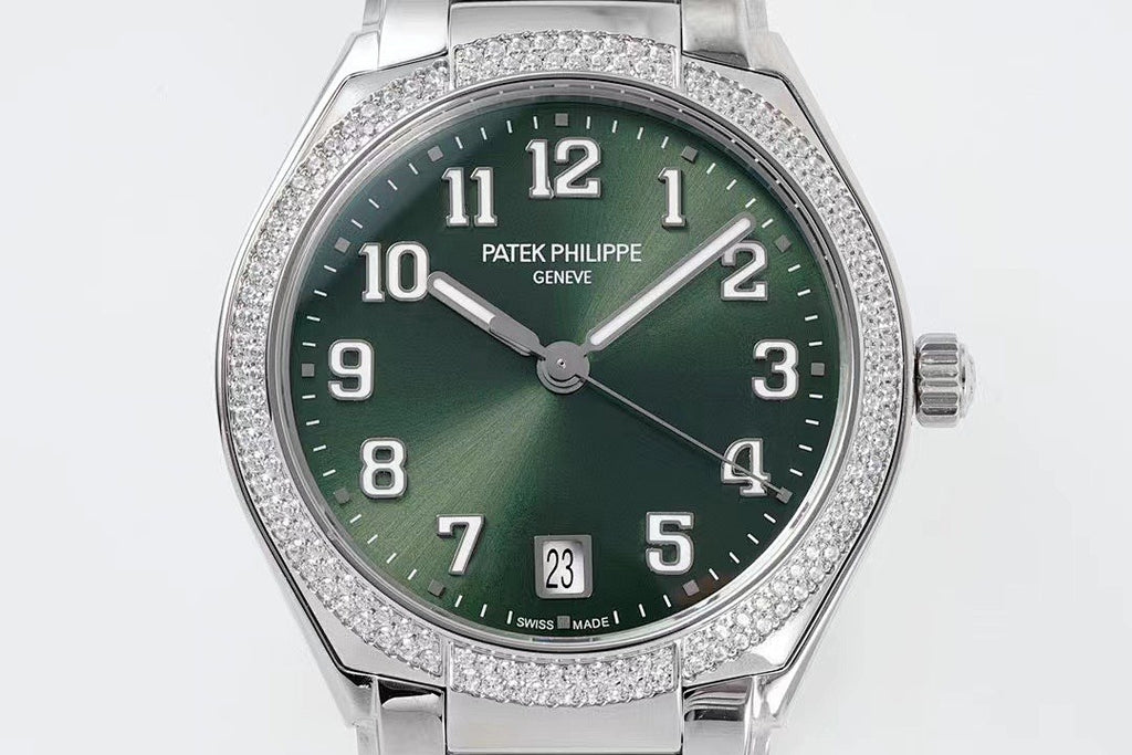 Men's steel wristwatch with green dial, diamond bezel, and date display