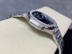 Steel wristwatch case and bracelet with blue dial and crown detail