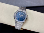 Blue dial steel wristwatch on bracelet with baton hour markers and seconds hand