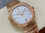 Patek Philippe wristwatch close-up with gold-tone bezel, light blue striped dial, baton markers