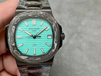Patek Philippe watch turquoise dial crown side detail textured case metal bracelet