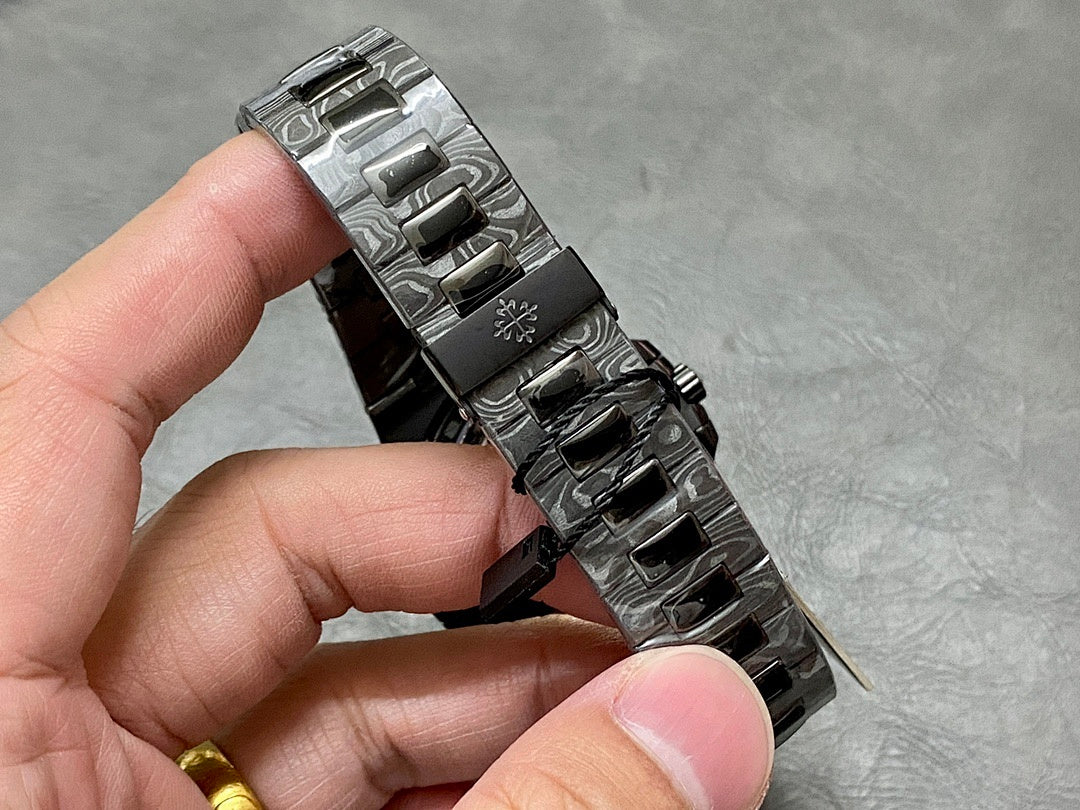 Patek Philippe watch bracelet links and clasp metal, hand holding
