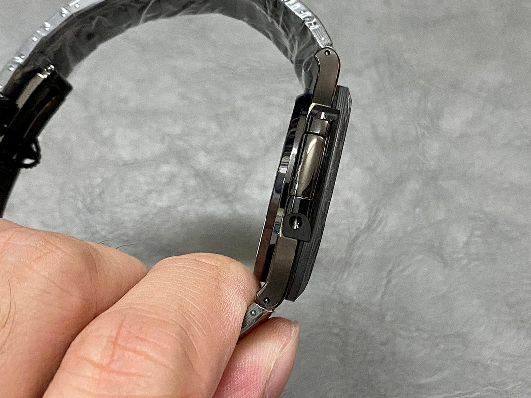Patek Philippe watch clasp buckle on metal bracelet close-up