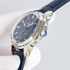 Patek Philippe watch with blue dial, silver case, and navy leather strap, side profile