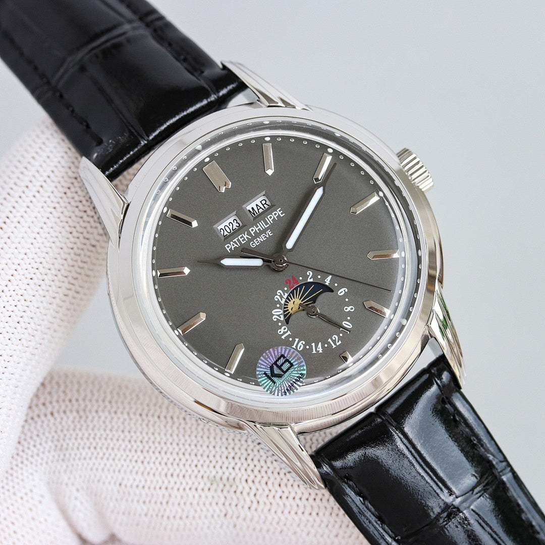 Patek Philippe wristwatch with black dial and black leather strap, silver bezel