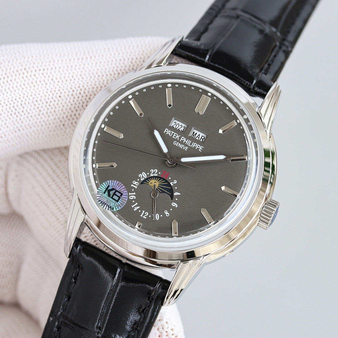 Patek Philippe wristwatch with black dial, silver case, and black leather strap