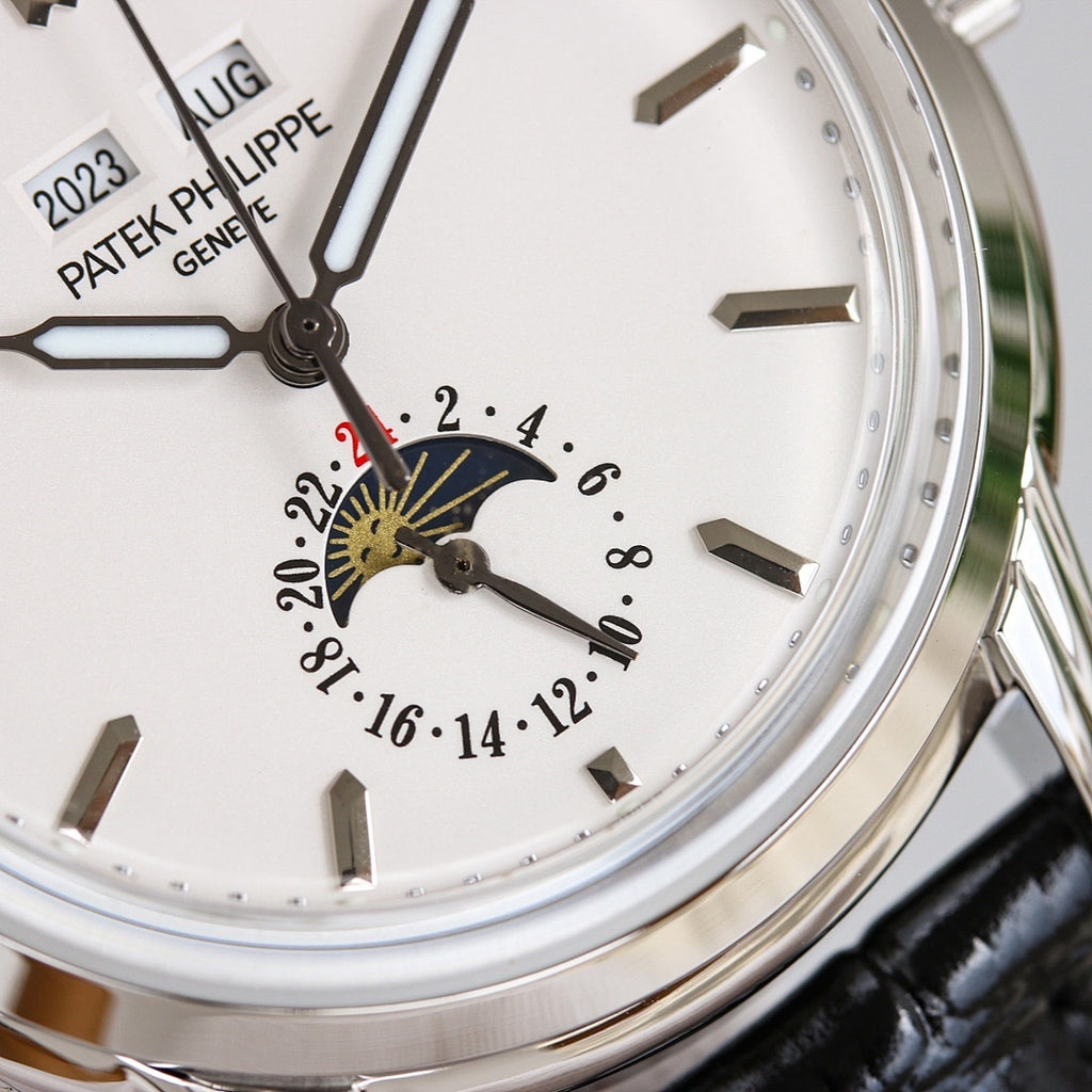 Patek Philippe watch dial close-up with stylized sunburst seconds subdial and date ring