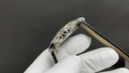 Patek Philippe wristwatch crown and side profile on polished case
