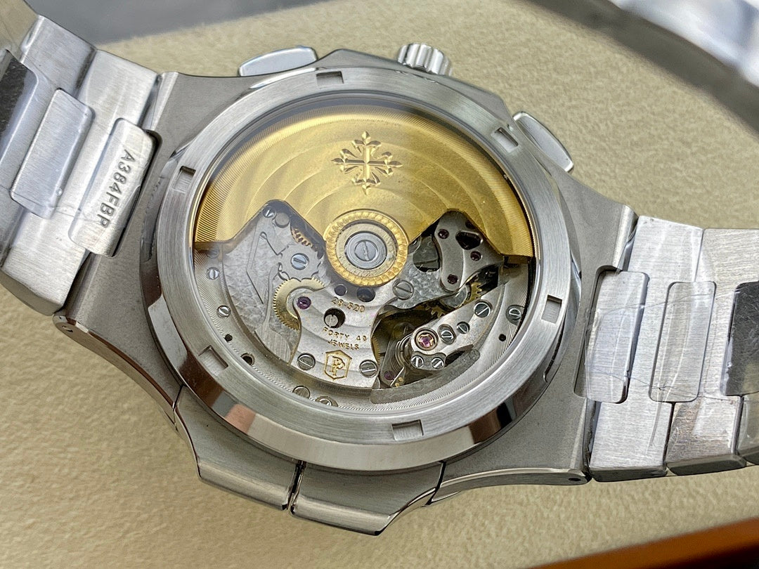 Patek Philippe wristwatch caseback with visible mechanical movement under glass.