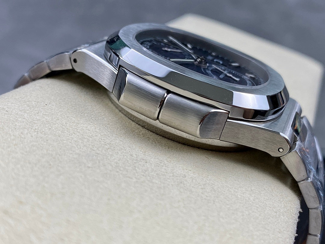 Stainless steel Patek Philippe wristwatch with ridged bezel edge in side profile.