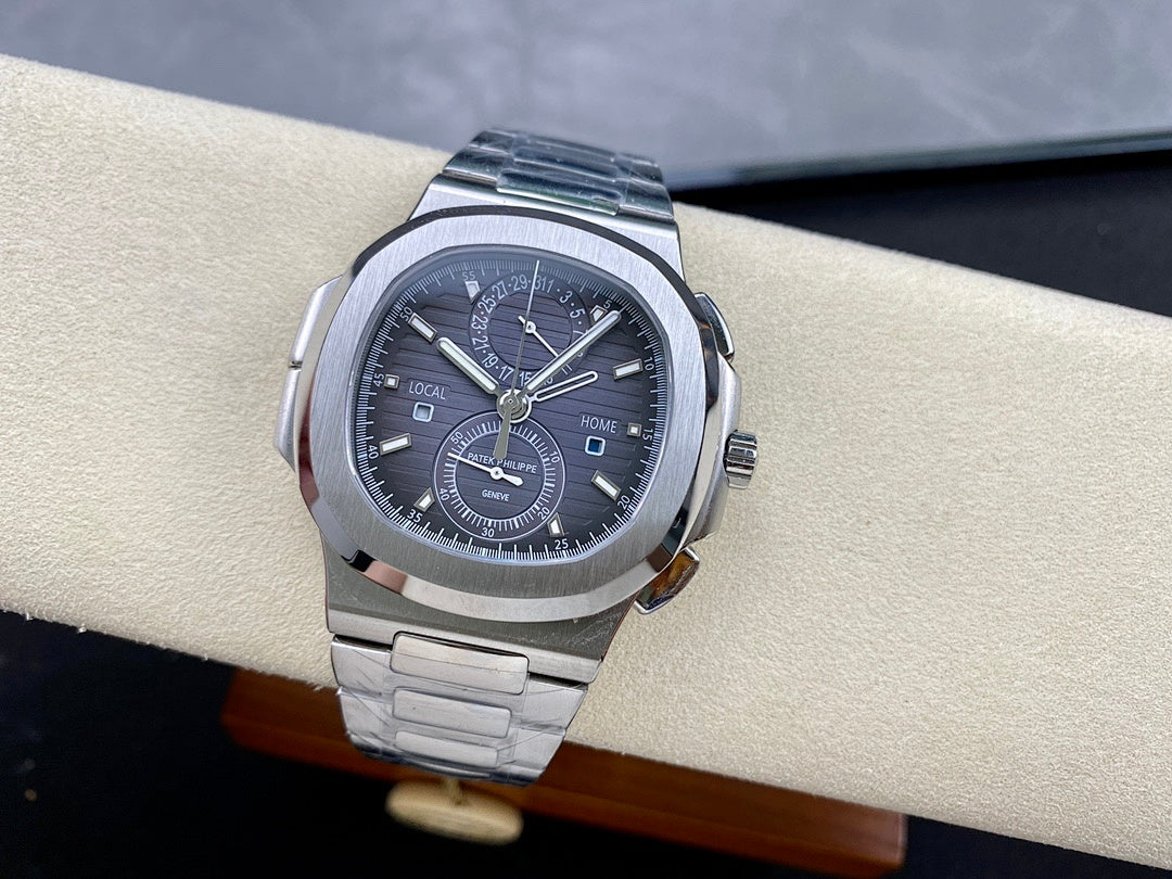 Stainless steel Patek Philippe wristwatch with black dial and subdial at 6 o'clock.